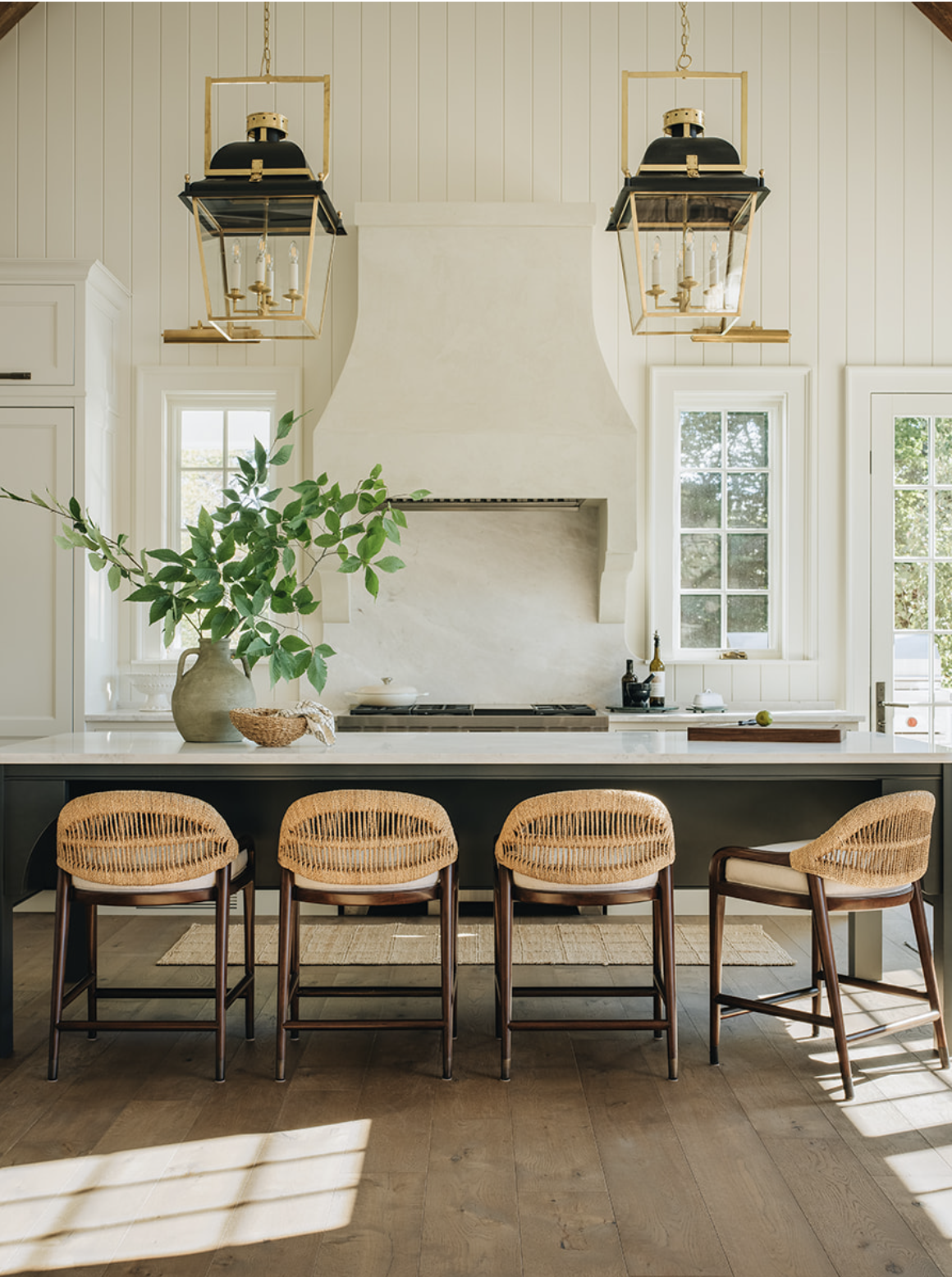 Jean Stoffer Design - Kitchen with white clapboard and black and gold lanterns -Stoffer Photography Interiors
