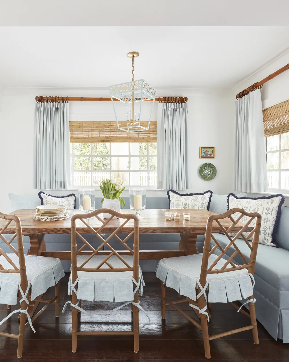 Kara Miller Interiors | Brantley Photography - rectangle wood dining table with blue banquette