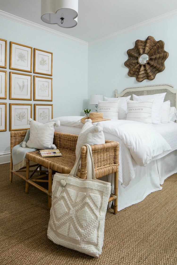 bedroom and wicker bench with Serena & lily with gallery wall