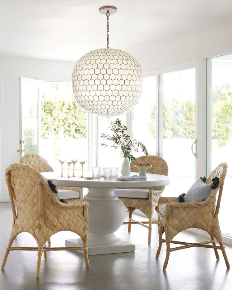 Serena & Lily dining stately table and wicker chairs