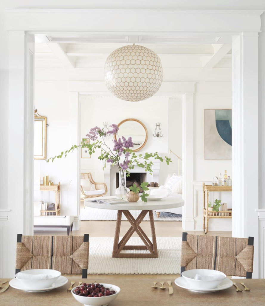 Holidays shopping with Serena & Lily entry with round table and round chandelier