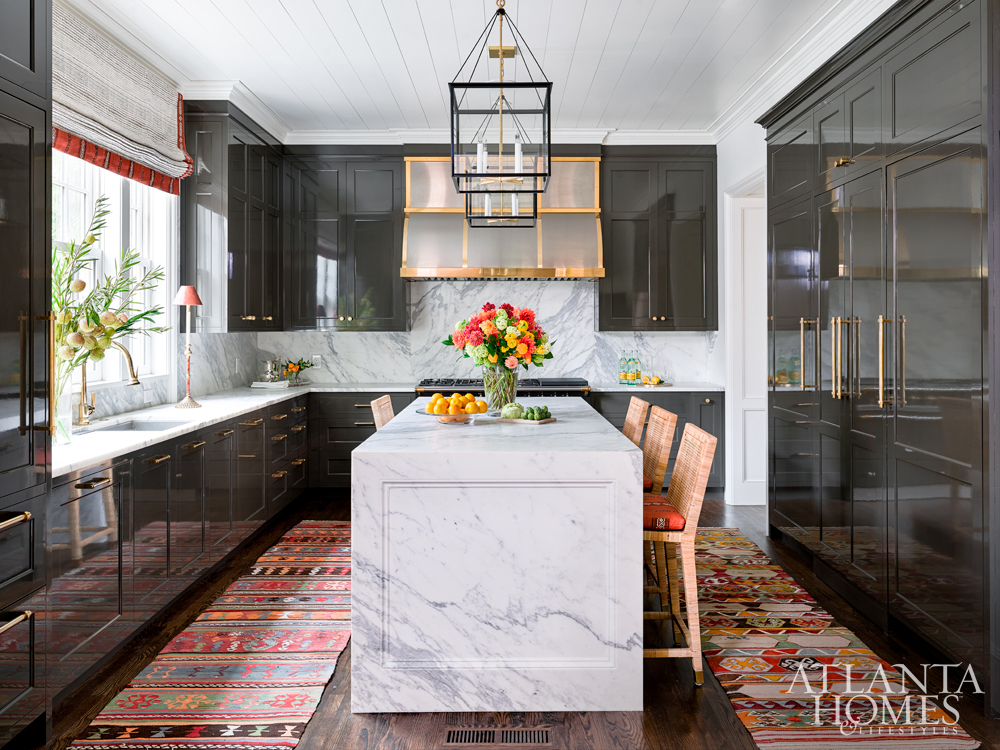 kitchen design winners marble island with brass hardware and orientlal rugs