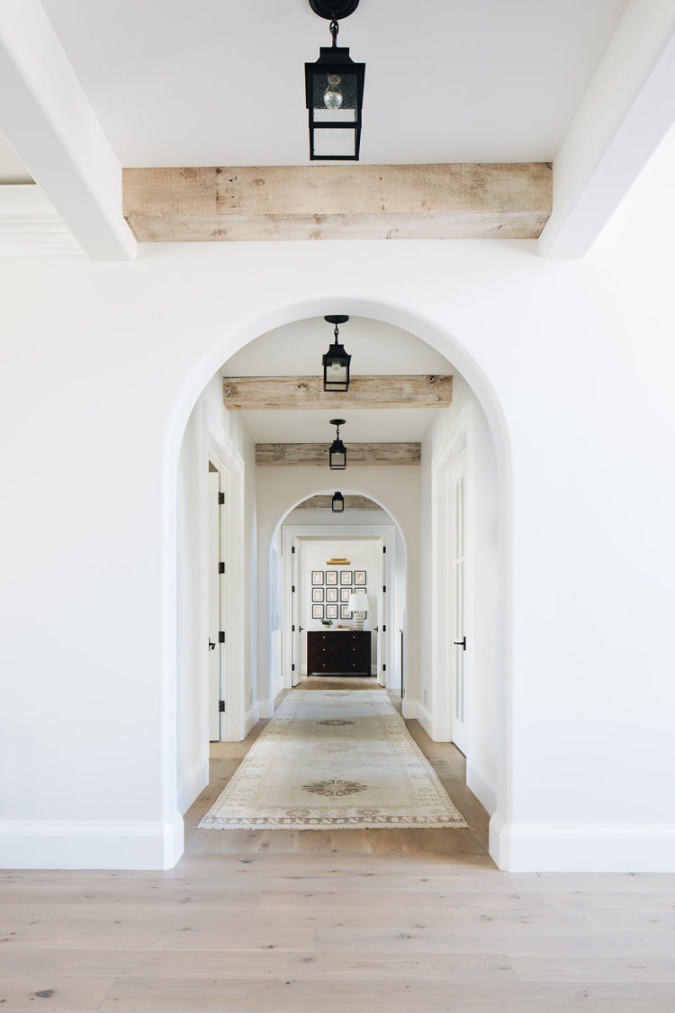 Kate Marker Interiors entry with blonde wood beams