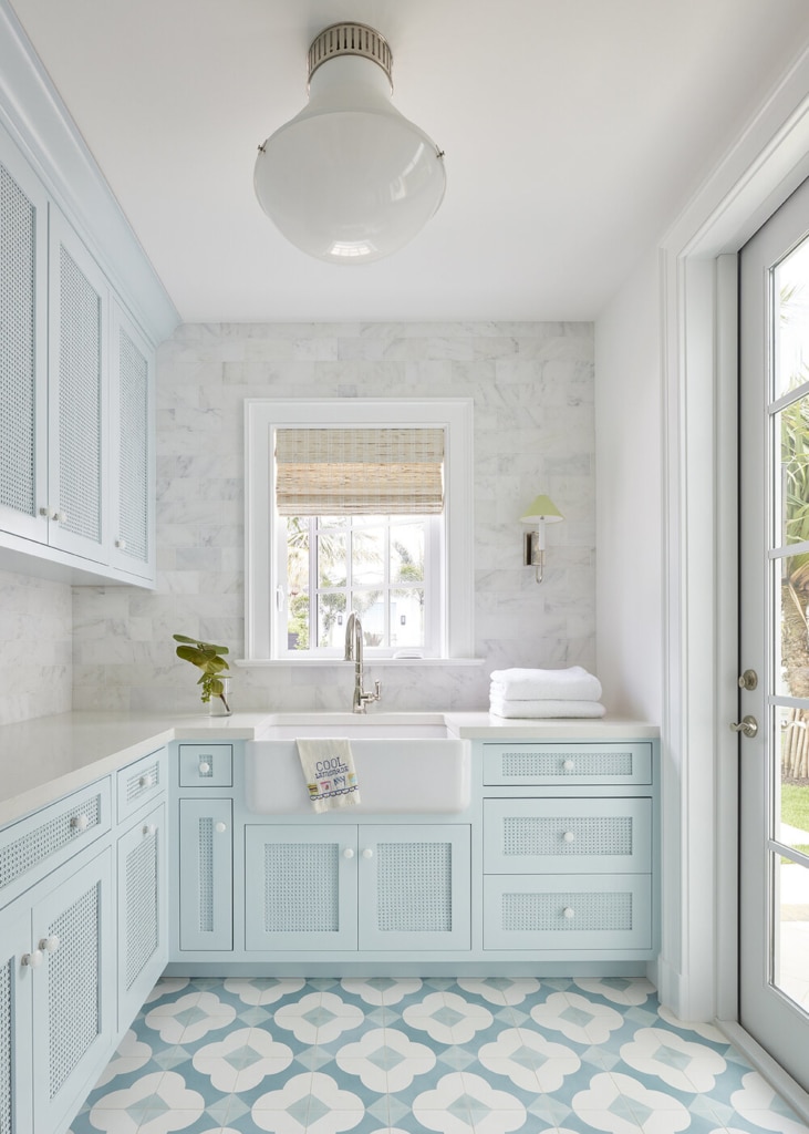 Kara Miller interiors laundry room with blue and white tile