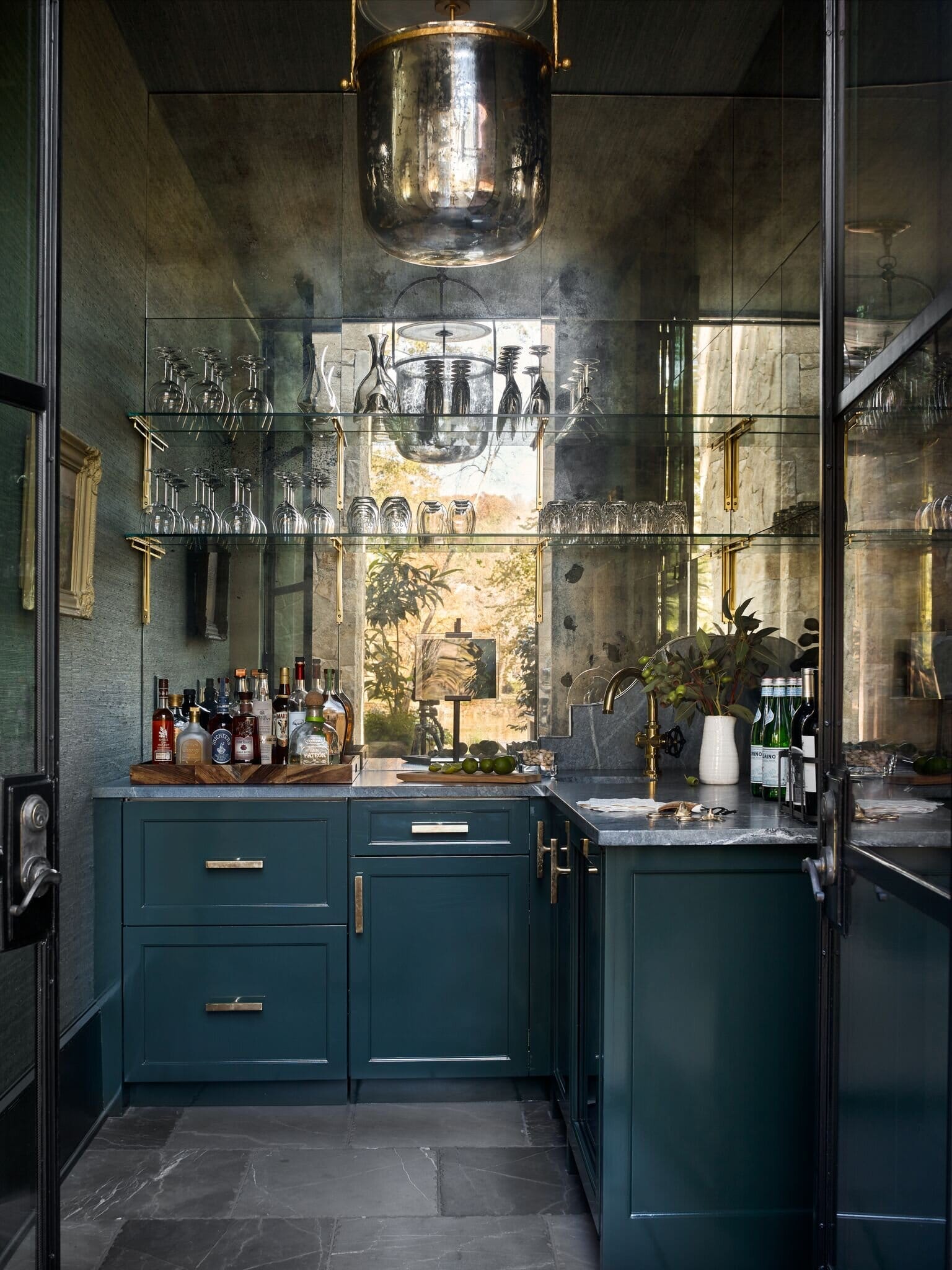 The Design Atelier wet bar with antique mirror