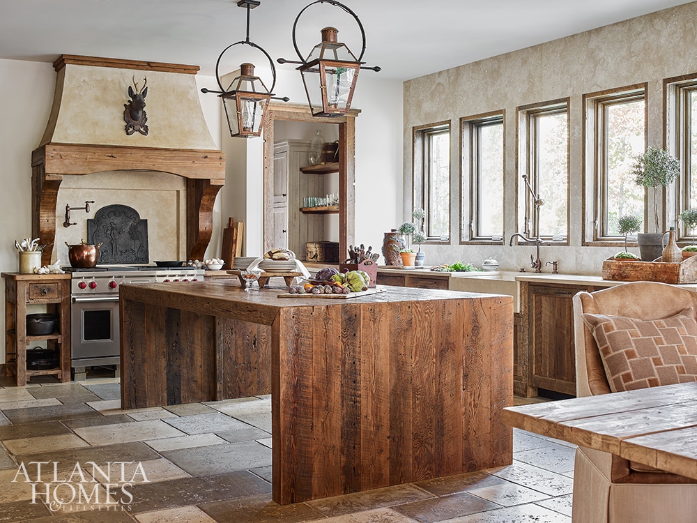 country house kitchen with lanterns over island