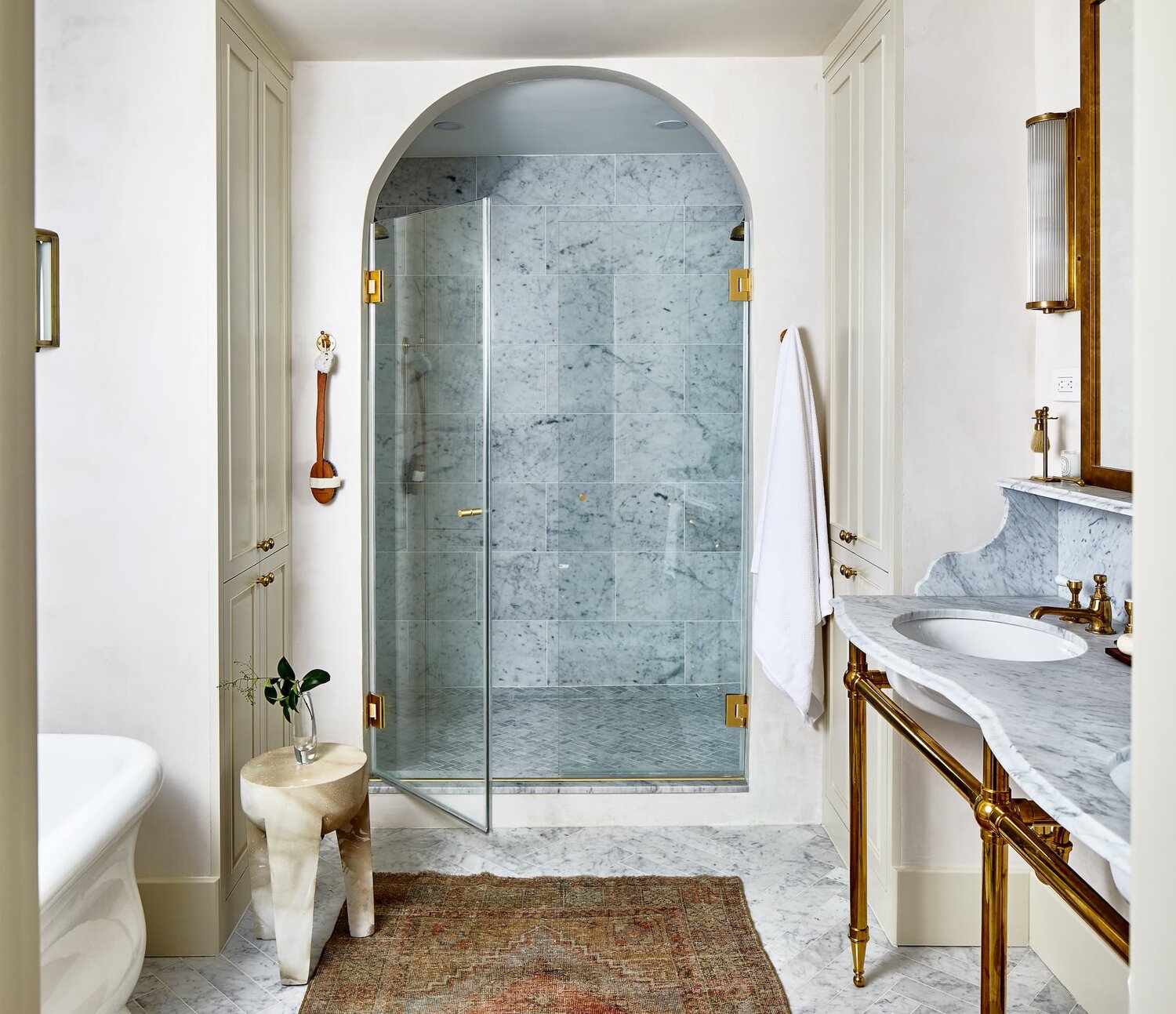 Zoe Feldman shower in bathroom with glass frameless door