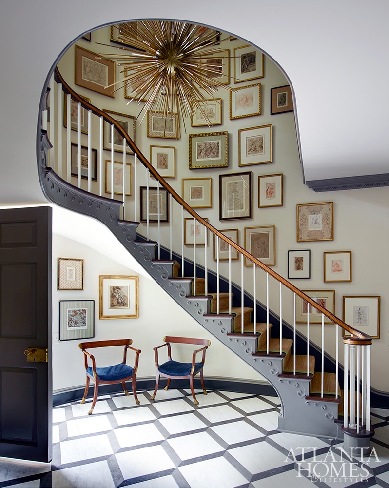 Tammy Connor Design Georgian Revival entry with gallery wall