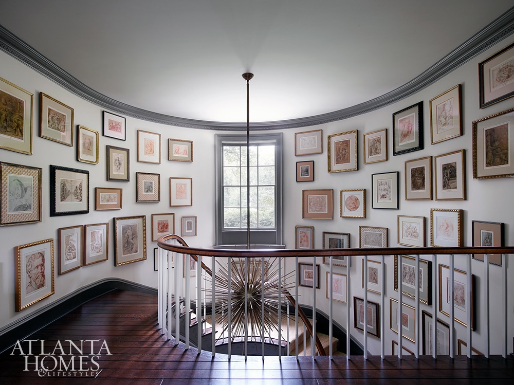 Tammy Connor Design Georgian Revival gallery wall in staircase