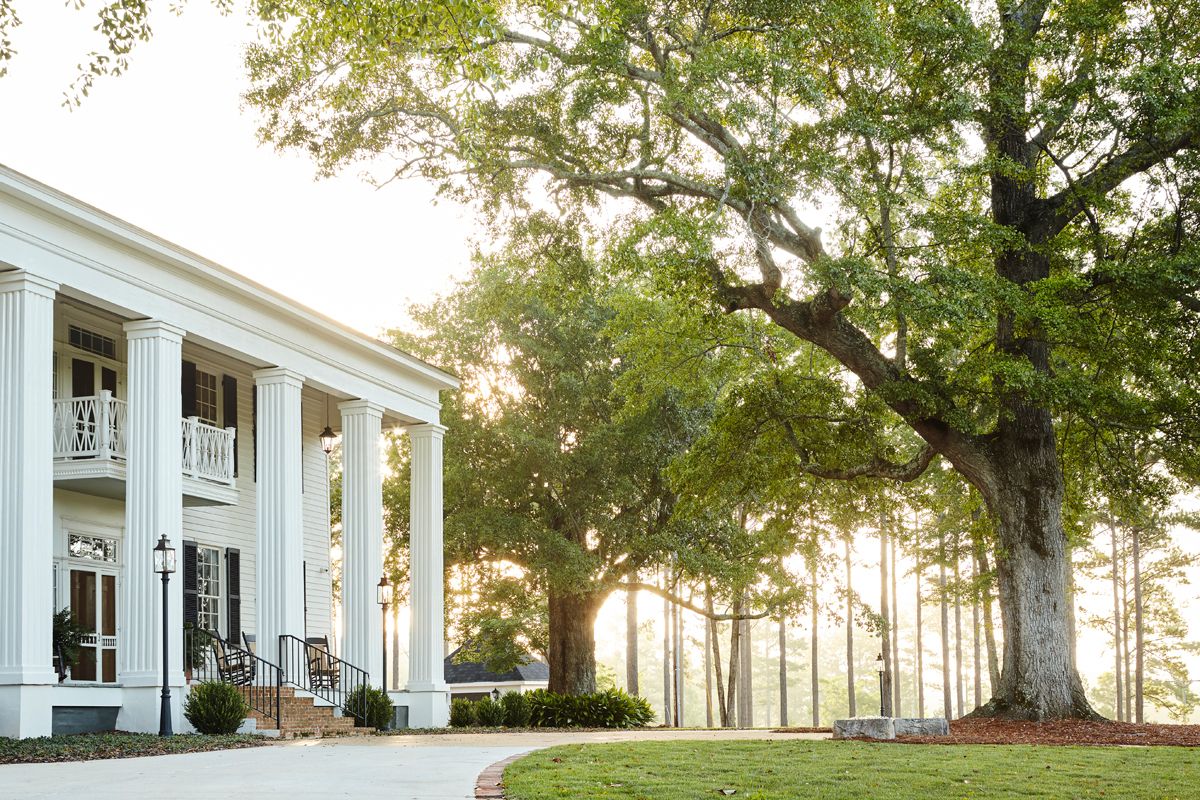 James F. Farmer Interior Design | Emily Followill Photography white house | white columned house | columns | black shutters | Southern Estate - architecture - architect