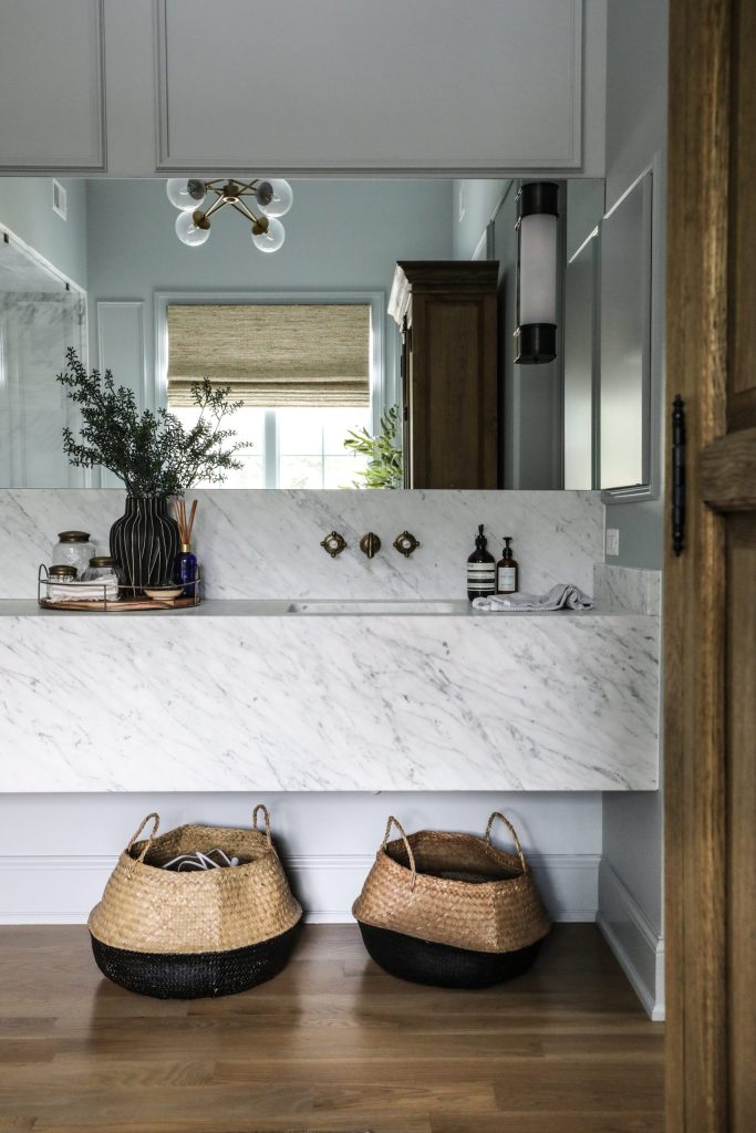 bathroom with marble countertop
