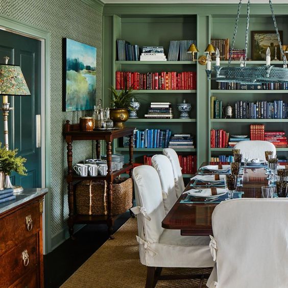 Meredith Ellis Design dining room with bookcases for a library