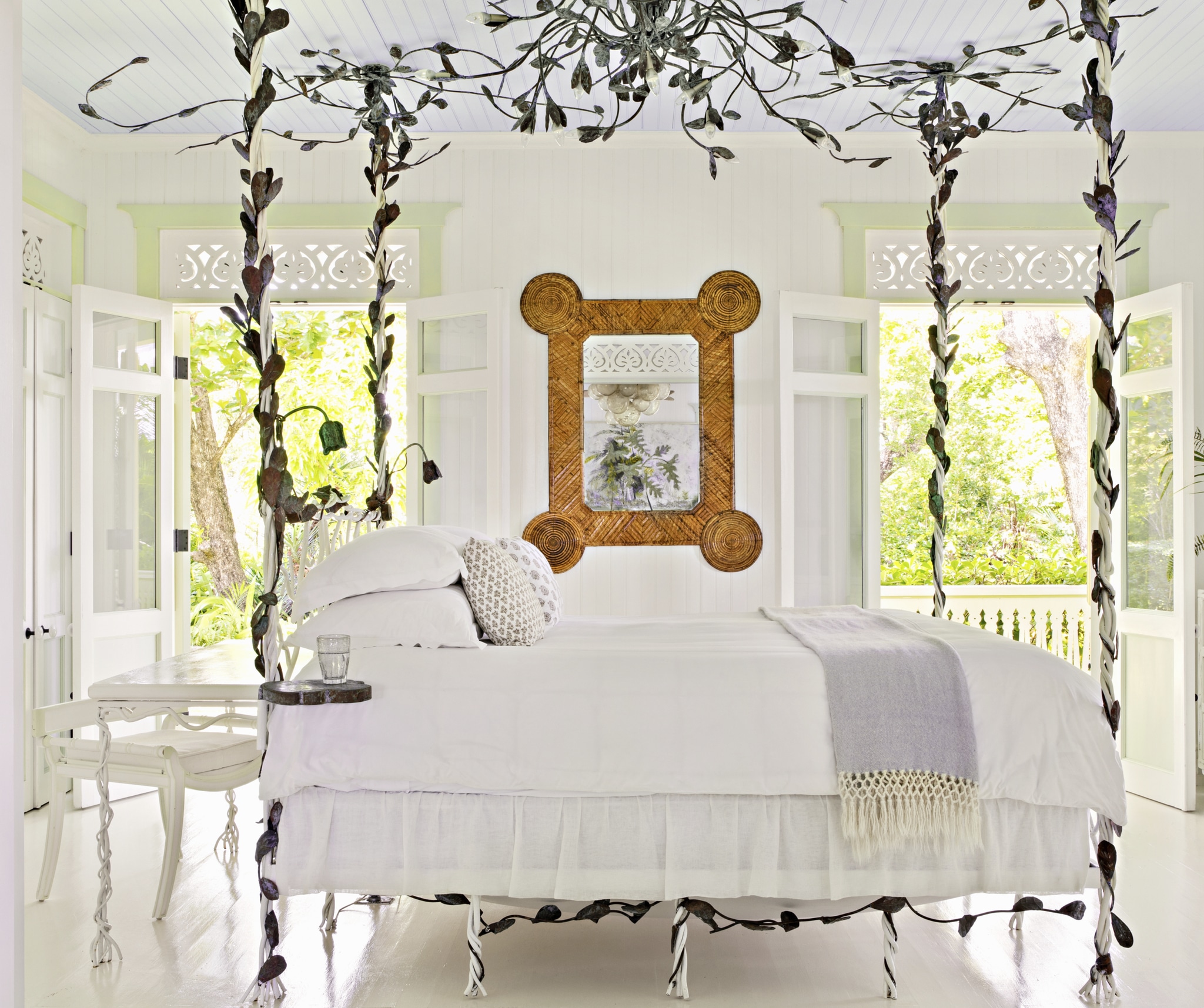bedroom with custom canopy bed
