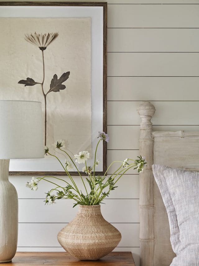 Melanie Milner Interior Design | Emily Followill Photography in this gracious bedroom vignette. Love the botanical print against the shiplap wall. headboard | flowers | bedroom design | bedroom decor | bedroom remodel