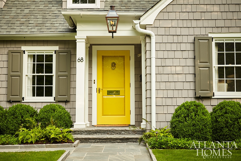 Brookwood Hills shingled house with yellow door