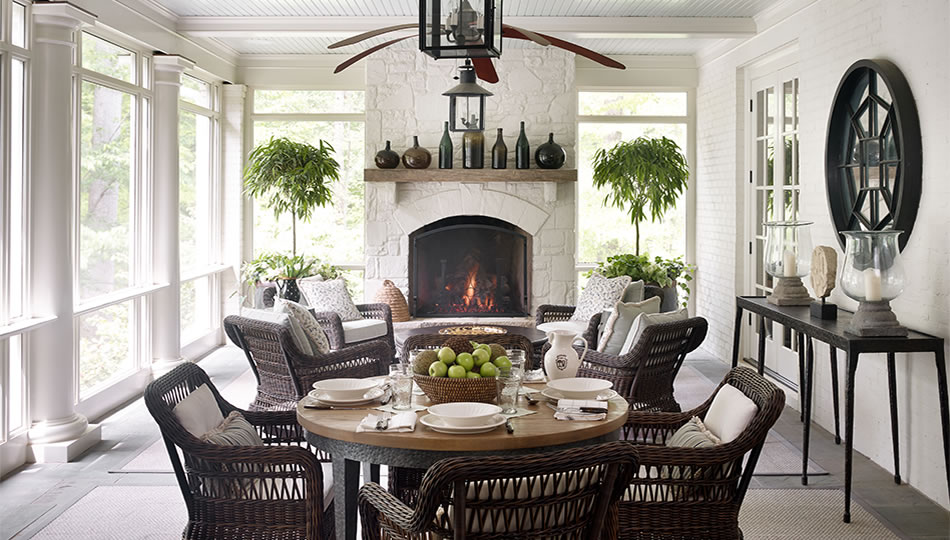  William Litchfield Architect Jackye Lanham designer Emily Followill Photography covered porch with brick fireplace. Love the wicker chairs and round dining table. 