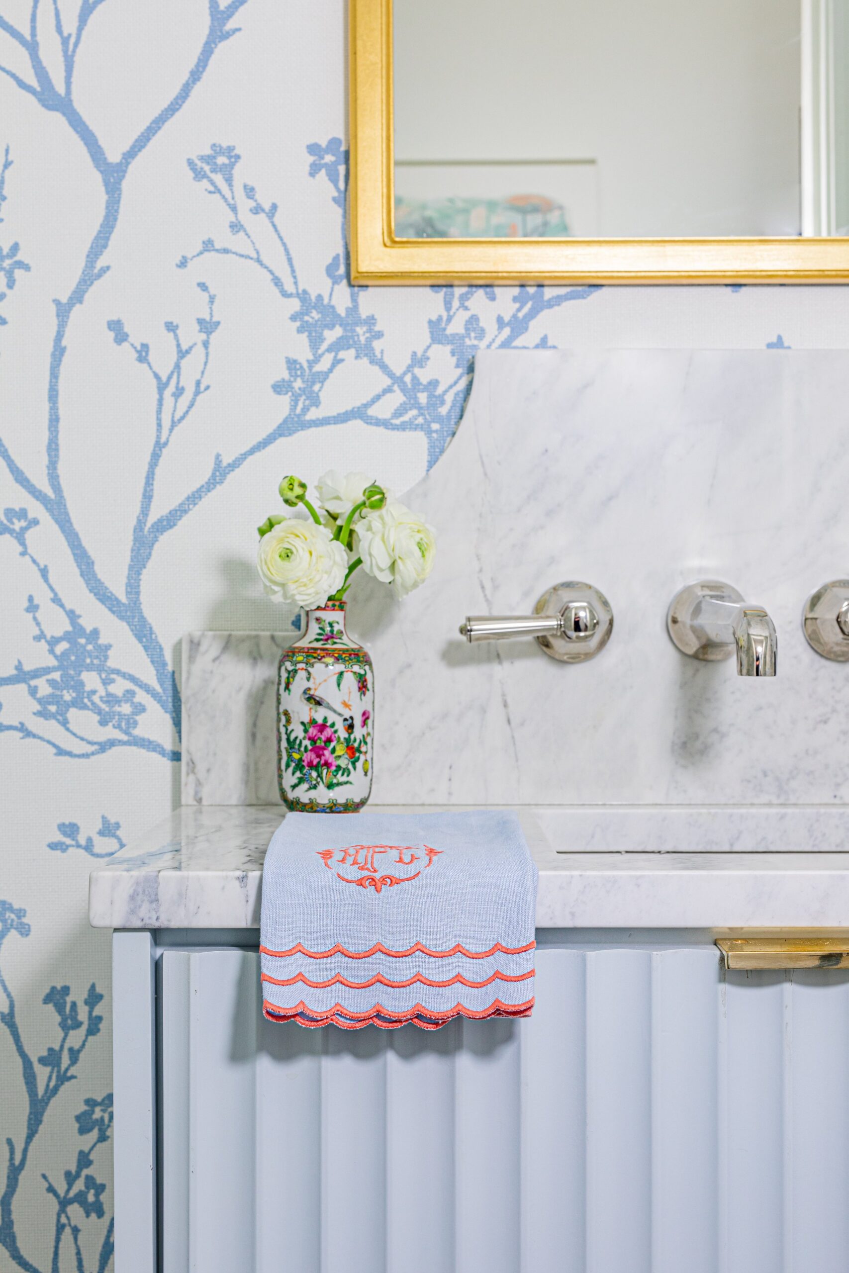 bathroom with blue and white handpainted wallpaper -Emery Davis Photography Lindley Arthur Interiors