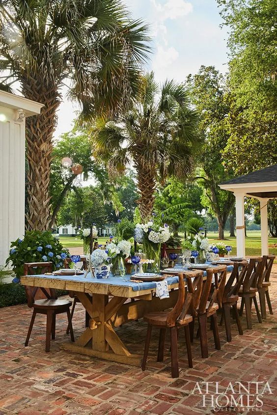 Southern Sophistication - 19th Century Estate in Atlanta Homes and Lifestyles | Interiors:  Susan Lapelle, Lapelle Interiors | Landscape Design:  Carson McElheney Landscape Architecture & Design | Photography: Emily Followill dining alfresco