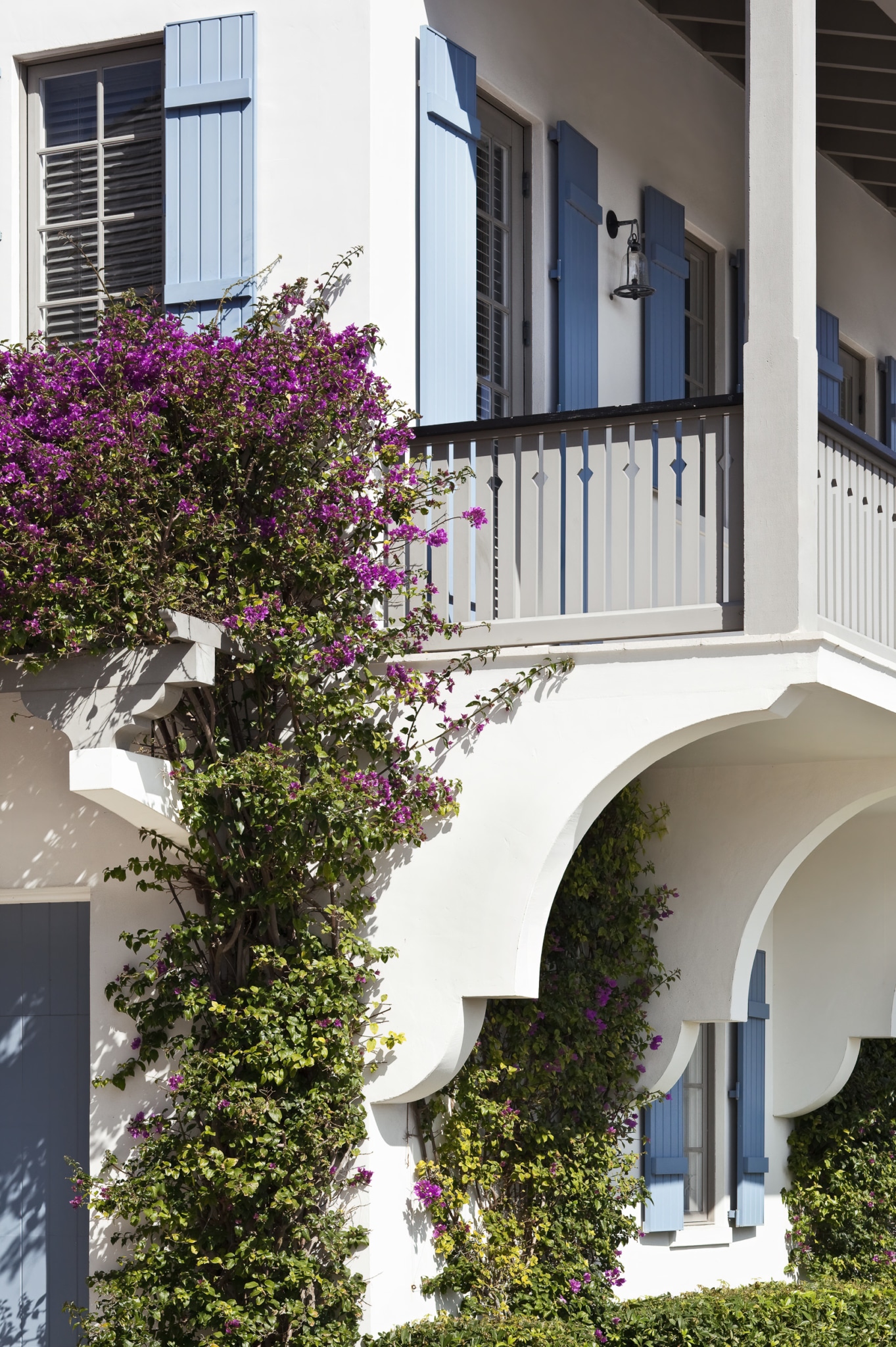 The architecture and design of Windsor a Vero Beach community - beachside - Jessica Glynn Photography - Hadley Keller Author - Vendome press -exterior with climbing bougainvillea