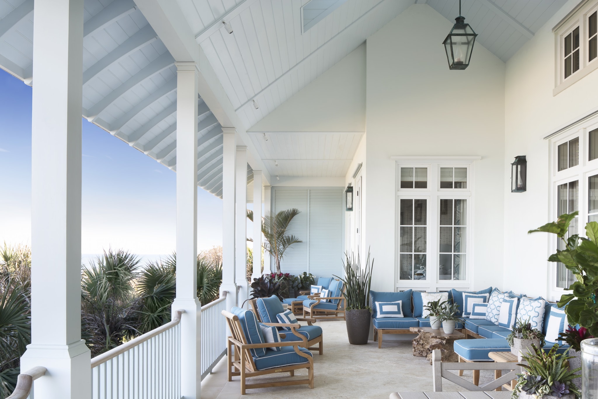 The architecture and design of Windsor a Vero Beach community - beachside - Jessica Glynn Photography - Hadley Keller Author - Vendome press - covered porch in blue and white