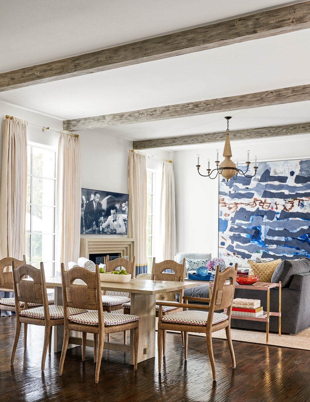 Delightful Dallas home from Designer Mary Beth Williams | Photography Nathan Schroder. Love the breakfast room with the wood beams and the keeping room with the amazing abstract art