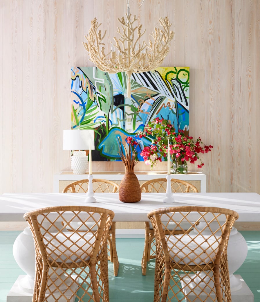 Dining room with abstract art and wood and coco beads chandelier and texture woven chair | dining room ideas | dining room decor | | blonde wood | rectangle table 