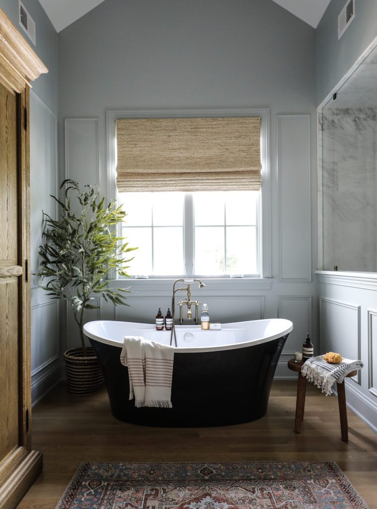 Captivating bathroom with a freestanding tub. Love the texture of the woven shades. bathroom decor | bathroom design | bathroom remodel | interior design | interiors 