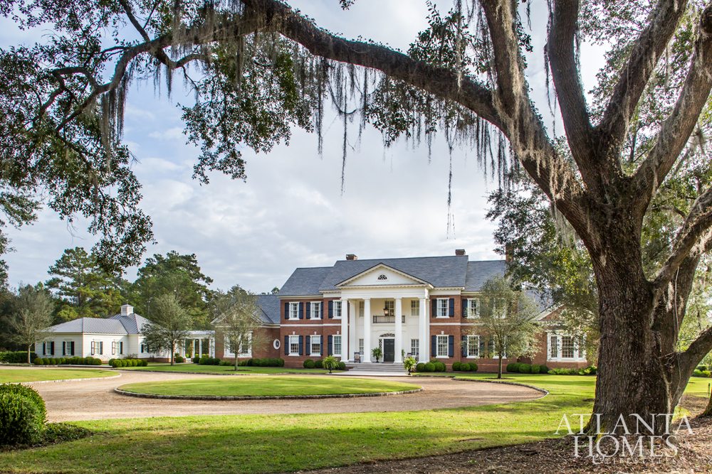 Source: Atlanta Homes & Lifestyles | Architect: C. Brandon Ingram | Interior Design: Mallory Mathison | Landscape Architect:  Carson McElheney | Photography:  Jeff Herr - extraordinary South Georgia red brick home with columns surrounded by moss covered live oaks