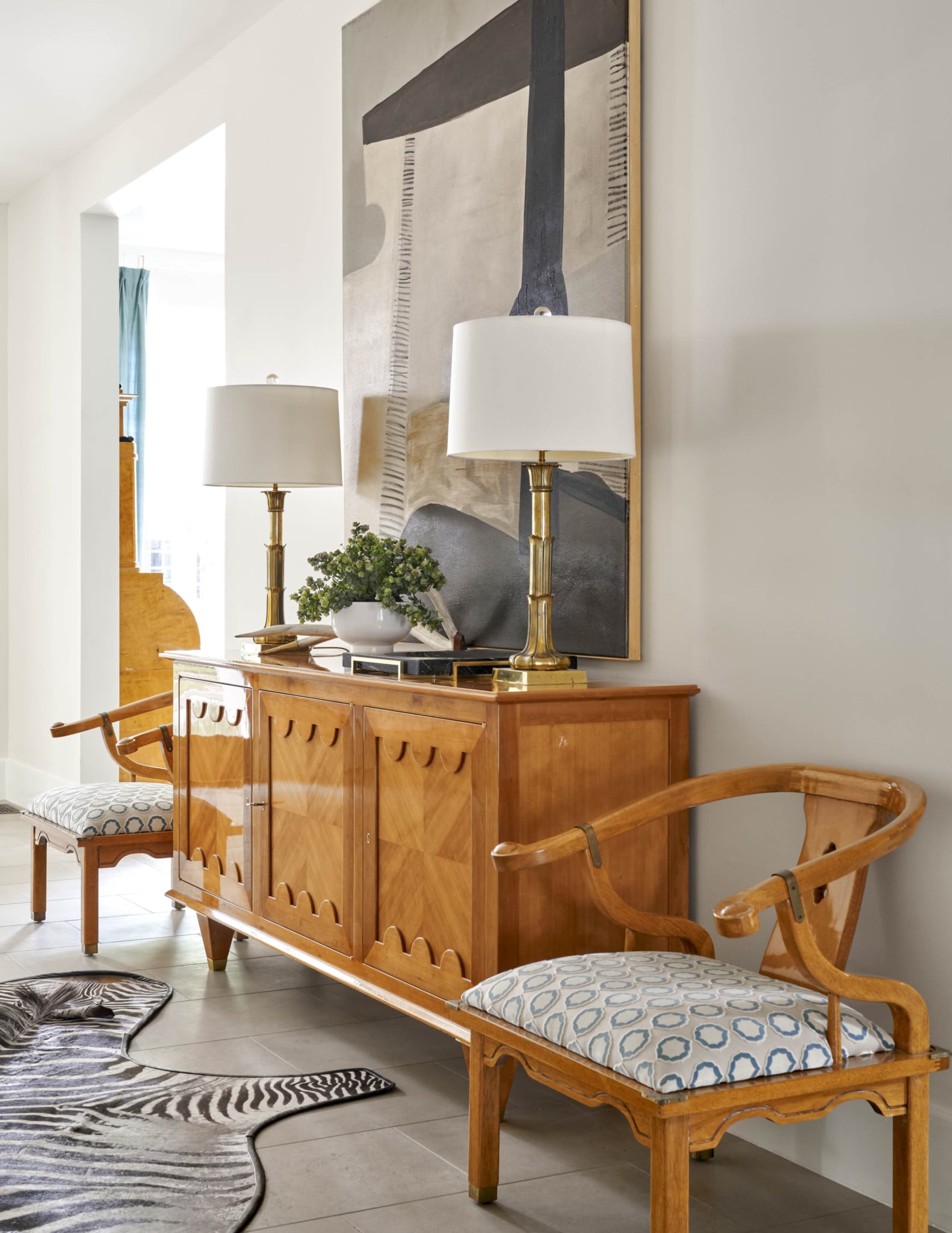 Mary Beth Wagner Interiors - Nathan Schroder Photography - abstract art in foyer -memorable entry - pair of lamps - pair of chairs - zebra rug