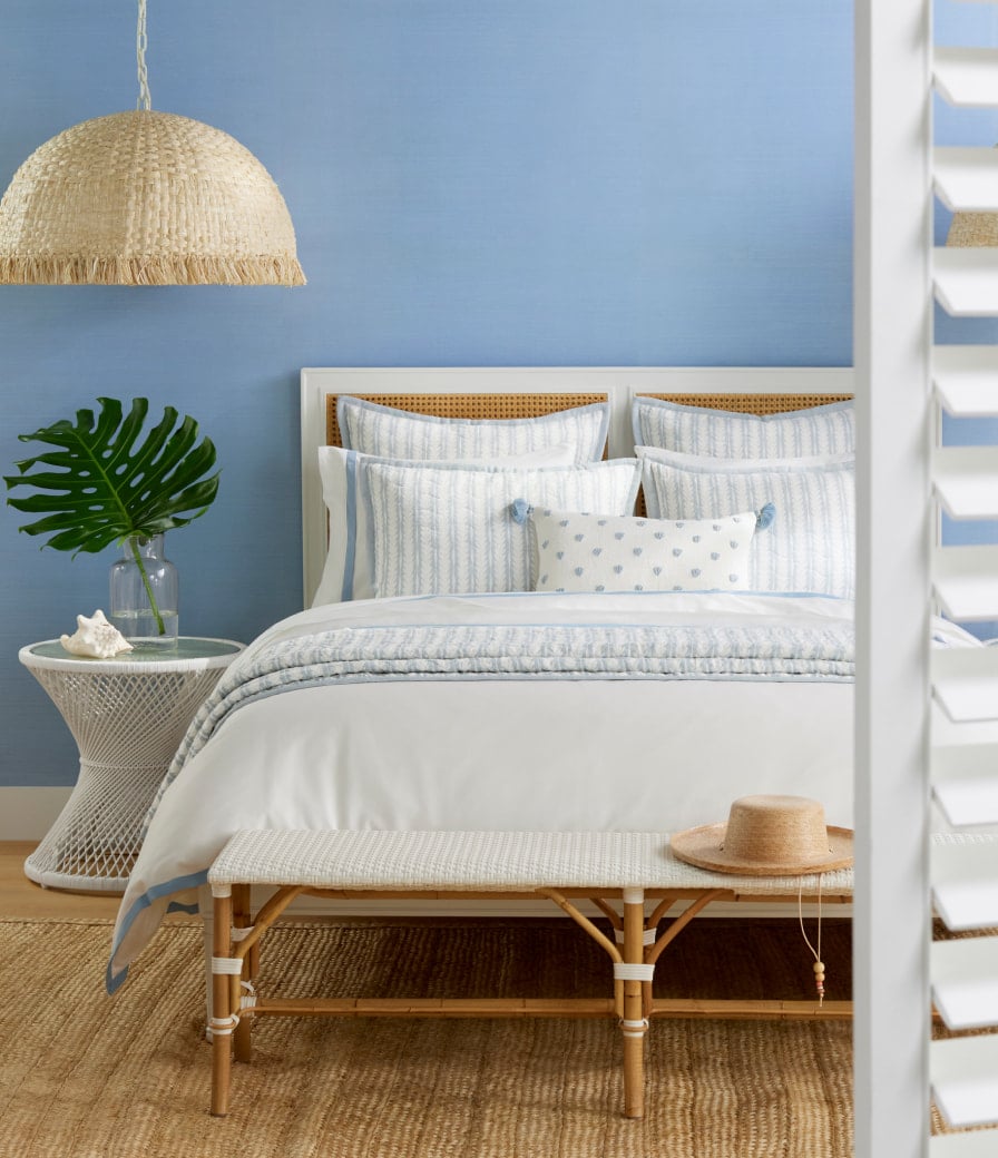 Serena and Lily blue and white bedroom with wicker pendant - bench at end of bed - bedroom decor - bedroom design - perfection