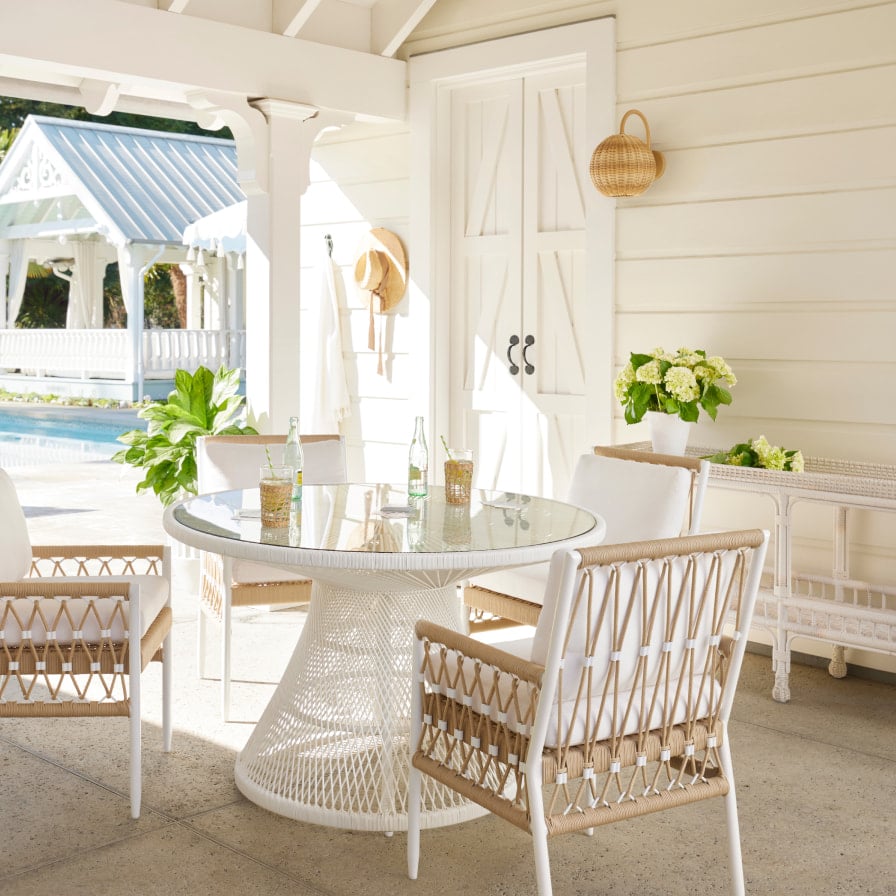 outdoor porch - dining al fresco - round table - dining table - round dining table - porch design - porch decor - Serena & lily