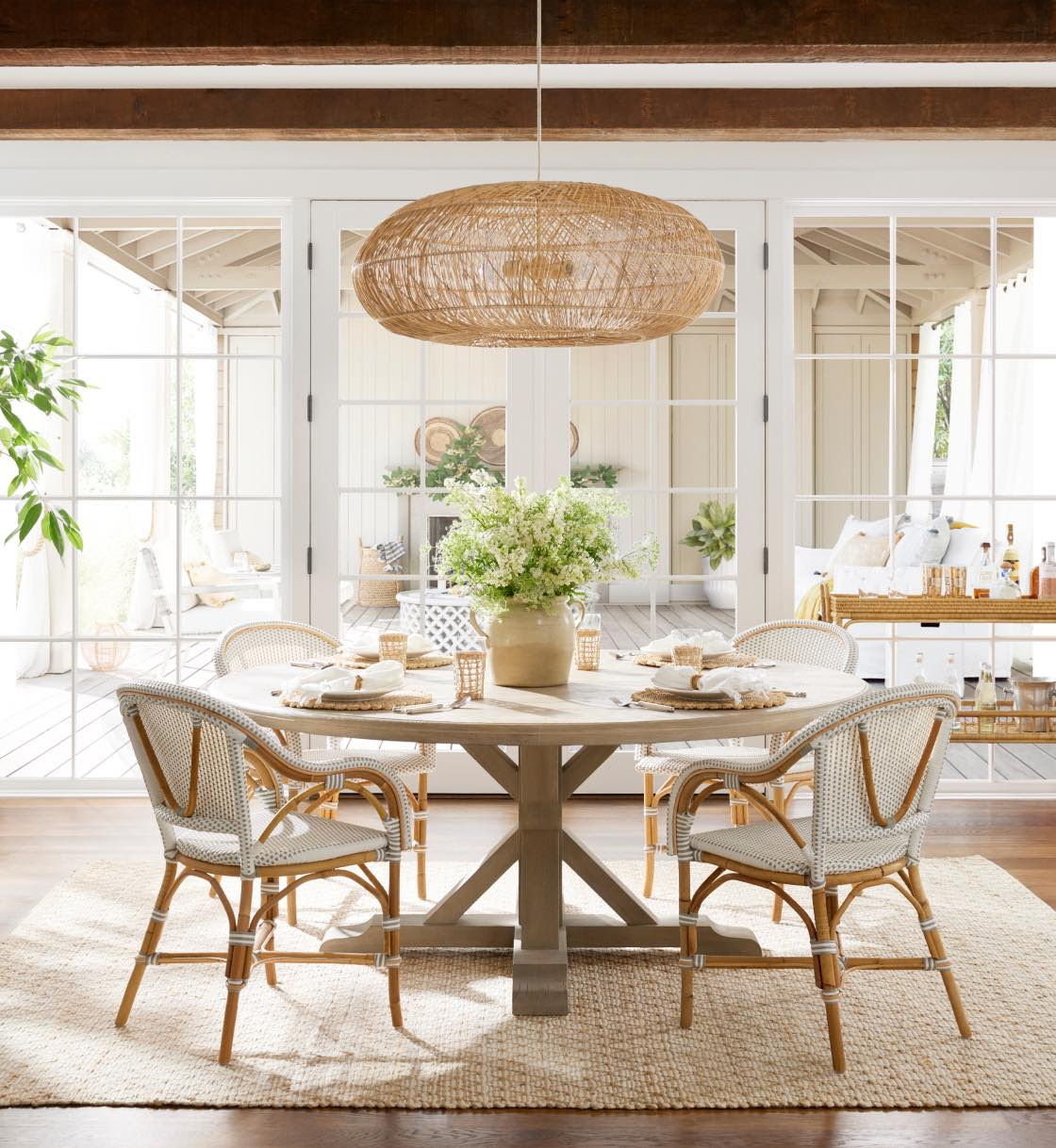Dining room - Serena & Lily - wood beams - round dining table - dining room decor