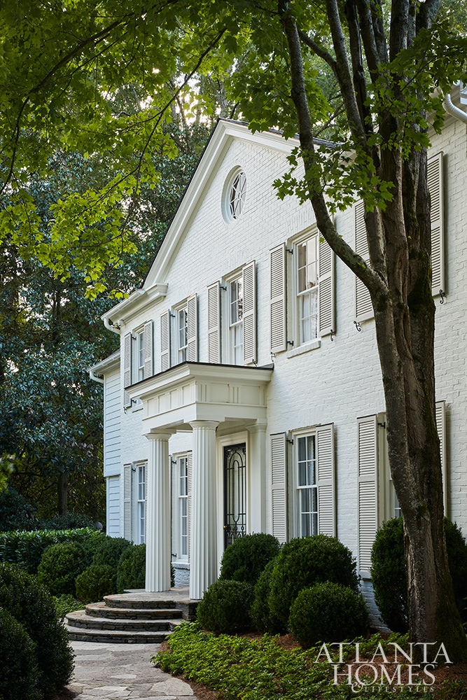 Curb appeal - white house - white brick house - Source: Atlanta Homes & Lifestyles | Interior Design:  Jackye Lanham| Architect:  Andrew Cogar, David VanGroningen and Connor Bingham of Historical Concepts  | Photography: Emily Followill -porch - covered porch lanterns