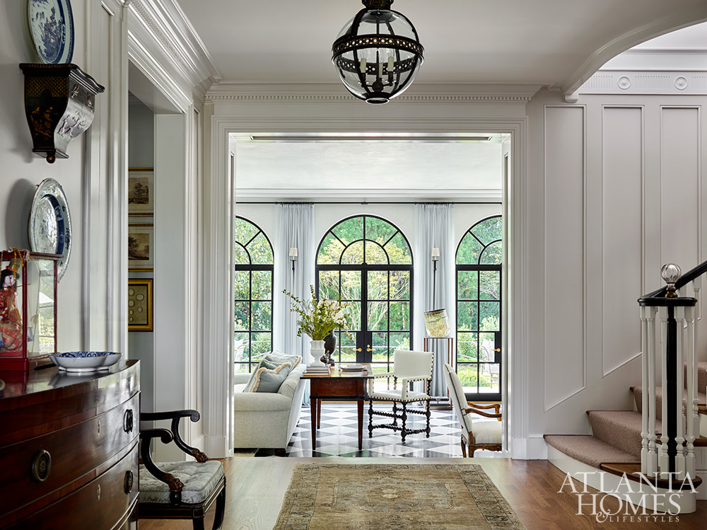 Source: Atlanta Homes & Lifestyles | Interior Design:  Jackye Lanham | Architect:  Andrew Cogar, David VanGroningen and Connor Bingham of Historical Concepts  | Photography: Emily Followill - foyer - welcome - staircase - Southern Georgian Home
