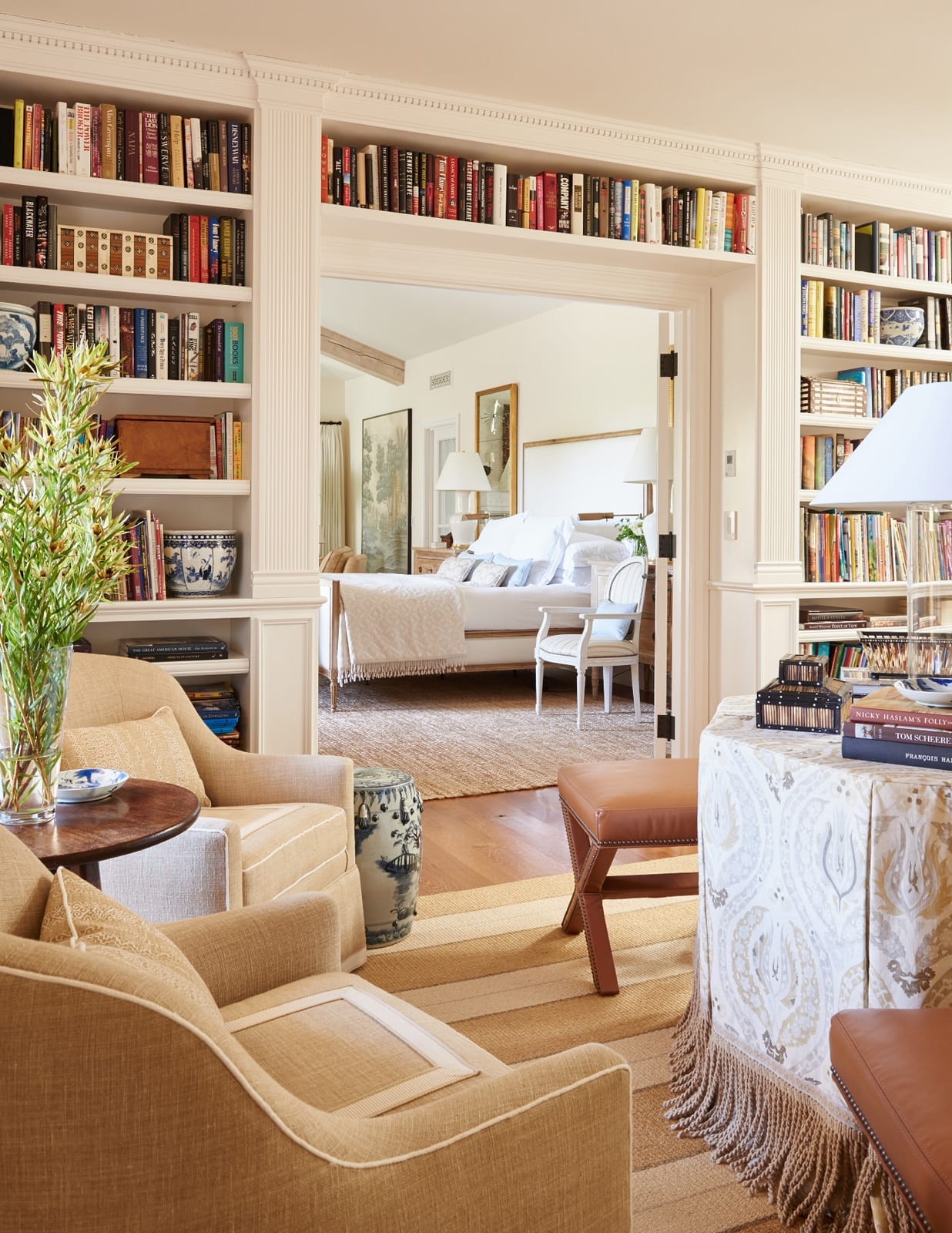 10 efforrtlessly styled bookcases - Mark D. Sikes Interiors _ Amy Neunsinger Photography - books - bookcases - living room - family room - round table