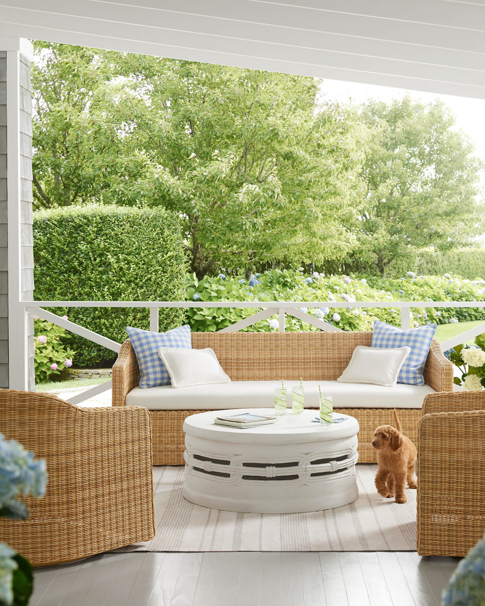 fashionable Outdoor Living room - Serena & Lily - wicker - wicker furniture - outdoor - porch - covered porch - outdoor rug