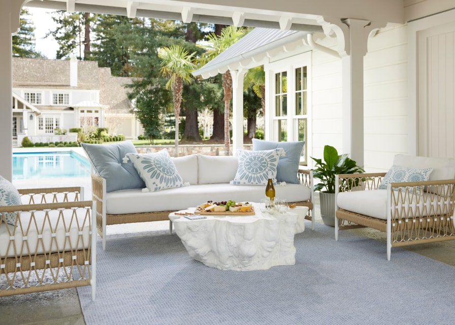 outdoor living - Serena & Lily - round table - covered porch - living room - outdoor living room