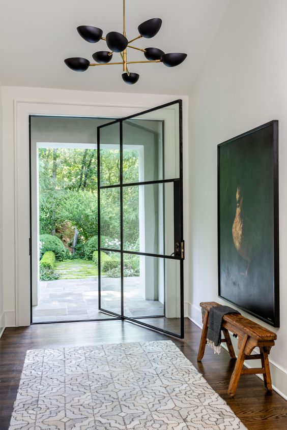 Chicly Elegant by Nancy Duffey Interiors - Jeff Herr Photography - abstract art - black and white - black steel door - chandelier, blog posts