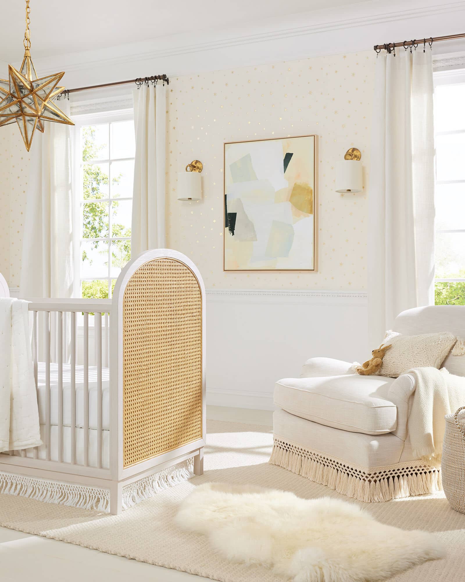 Chic neutral nursery from Serena & Lily - wicker crib - abstract art