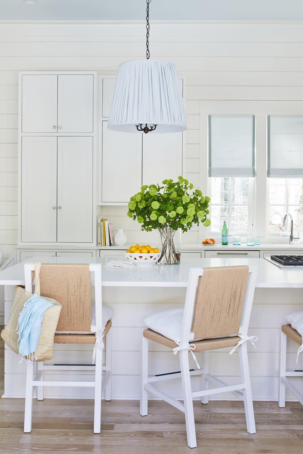 Amid the idyllic community of Watercolor, renowned interior designer Kara Miller has crafted a truly charming abode that captures the essence of coastal living. This exquisite home, beautifully photographed by Brantley Photography, bathed in a harmonious symphony of blue and white, exudes a sense of serenity and style.