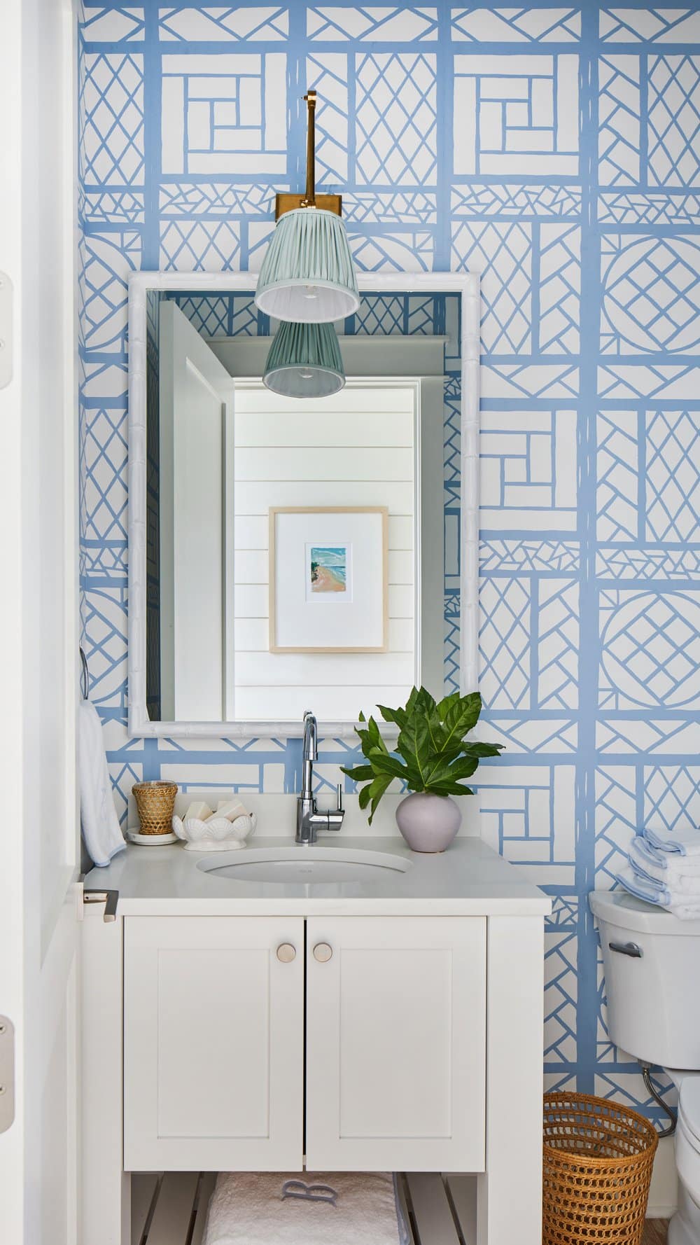Amid the idyllic community of Watercolor, renowned interior designer Kara Miller has crafted a truly charming abode that captures the essence of coastal living. This exquisite home, beautifully photographed by Brantley Photography, bathed in a harmonious symphony of blue and white, exudes a sense of serenity and style.