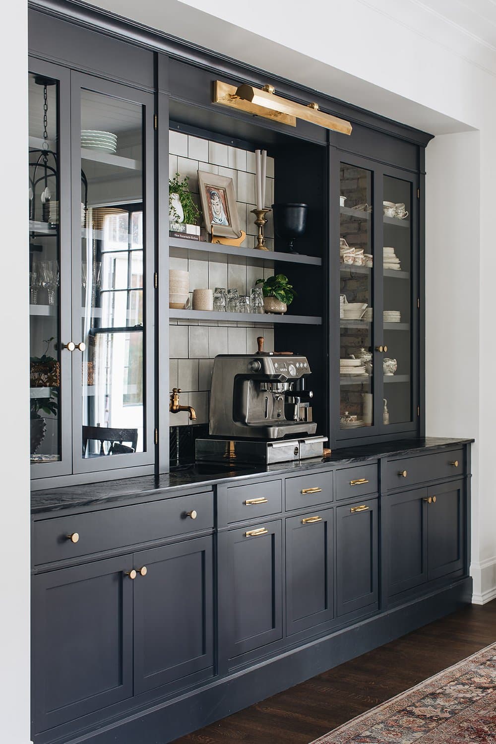 Designing a small coffee bar within your kitchen can add both functionality and charm to your space. Jean Stoffer Design | Stoffer Photography Interiors