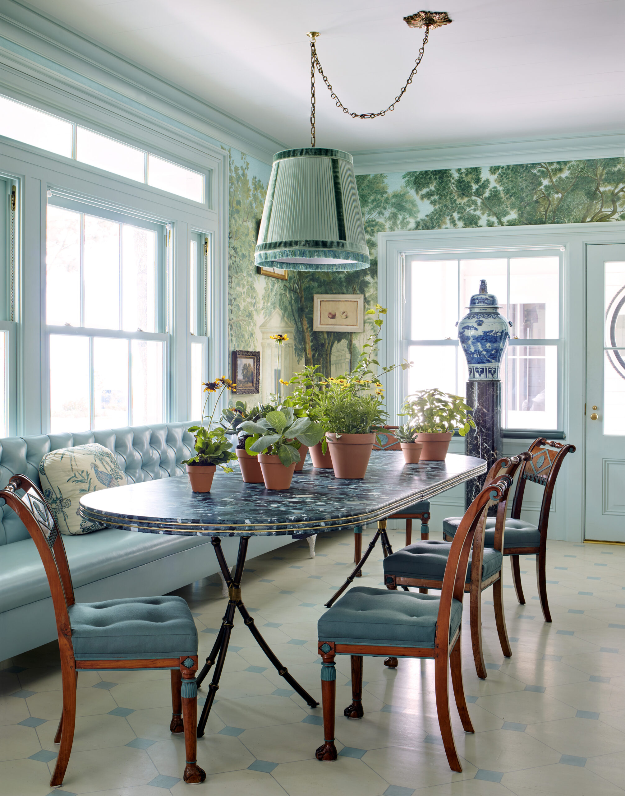 When it comes to inspired architecture, Curtis and Windham  is in a class all their own. The traditional interior design ideas are evident in the tufted leather banquette and the beautiful wallpaper