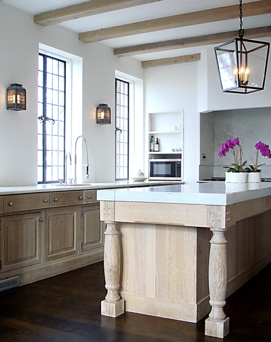  Paul Bates Architecture and Interiors - kitchen with blonde wood and honed marble countertops