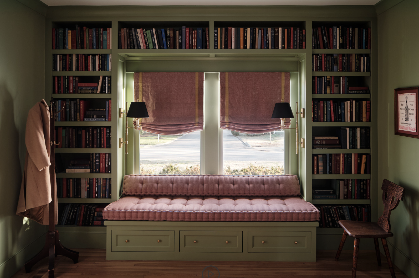 Great design is all about the details. And no one’s work embodies that more than the good taste of Sabbe Interior Design.  With her brilliant use of layering in interior design, she designs chic and sophisticated spaces that are perfect for family living!  Warm, inviting and completely livable…what could be better. Joseph Bradshaw Photography - charming window seat with tufted cushion and bookcase surrounding it