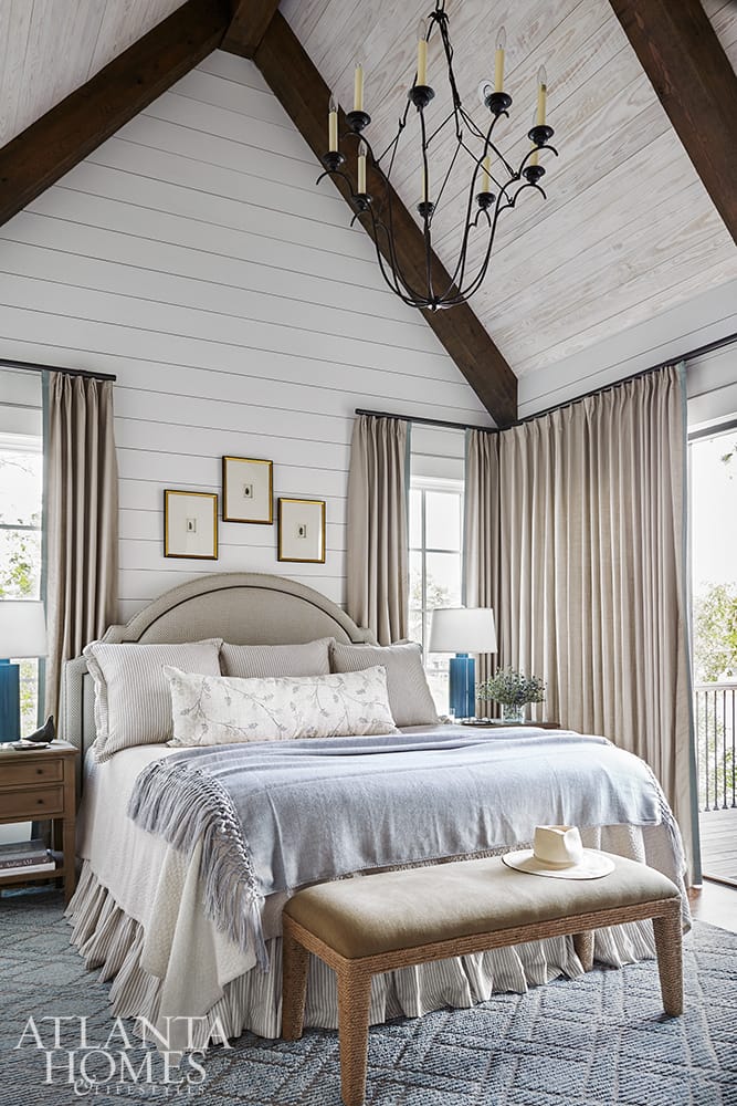 Lake Martin lake house designed by Liz Williams bedroom with cathedral ceiling PHOTOGRAPHER: Emily Followill INTERIOR DESIGN: Liz Williams Interiors lizwilliamsinteriors.com ARCHITECT:  Mitch Ginn, L. Mitchell Ginn & Associates LANDSCAPE ARCHITECT:  Outside Landscape Group