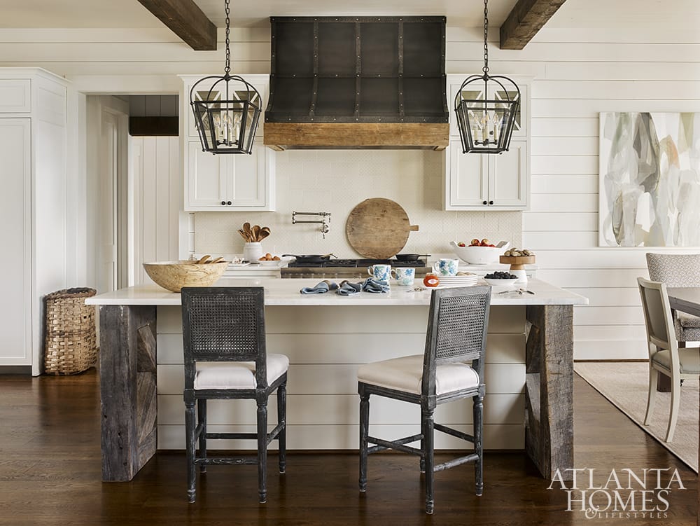 kitchen with stainless range hood and wood accessories - love these beautiful interior design ideas PHOTOGRAPHER: Emily Followill INTERIOR DESIGN: Liz Williams Interiors lizwilliamsinteriors.com ARCHITECT:  Mitch Ginn, L. Mitchell Ginn & Associates LANDSCAPE ARCHITECT:  Outside Landscape Group