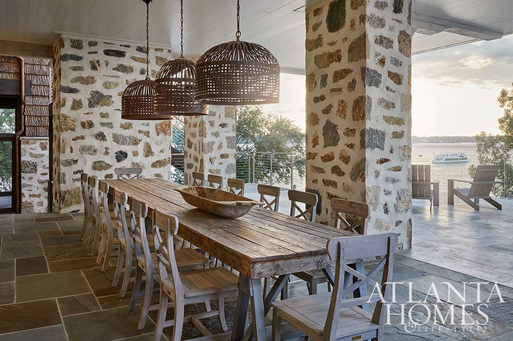 As summer comes to an end, we hope you can steal away for a moment to take a peek at this gorgeous Lake Norman home so beautifully photographed by Emily Followill and chicly styled by Eleanor Roper.  It’s a peaceful, calming home–with incredible views–that just might lend you a moment of serenity.  Jacquelynne P. Lanham Designs created a space that truly feels like a zen retreat, the perfect place to start a stress-free fall! Covered porch on flagstone patio with beautiful alfresco dining table Source: Atlanta Homes & Lifestyles Interior Designer: Jackye Lanham, Jacquelynne P. Lanham Designs  Architect: John D. Haley, John D. Haley  Builder: Scott McMillan, Kingswood Custom Homes, Inc. Landscape Architect: John Howard, Howard Design Studio