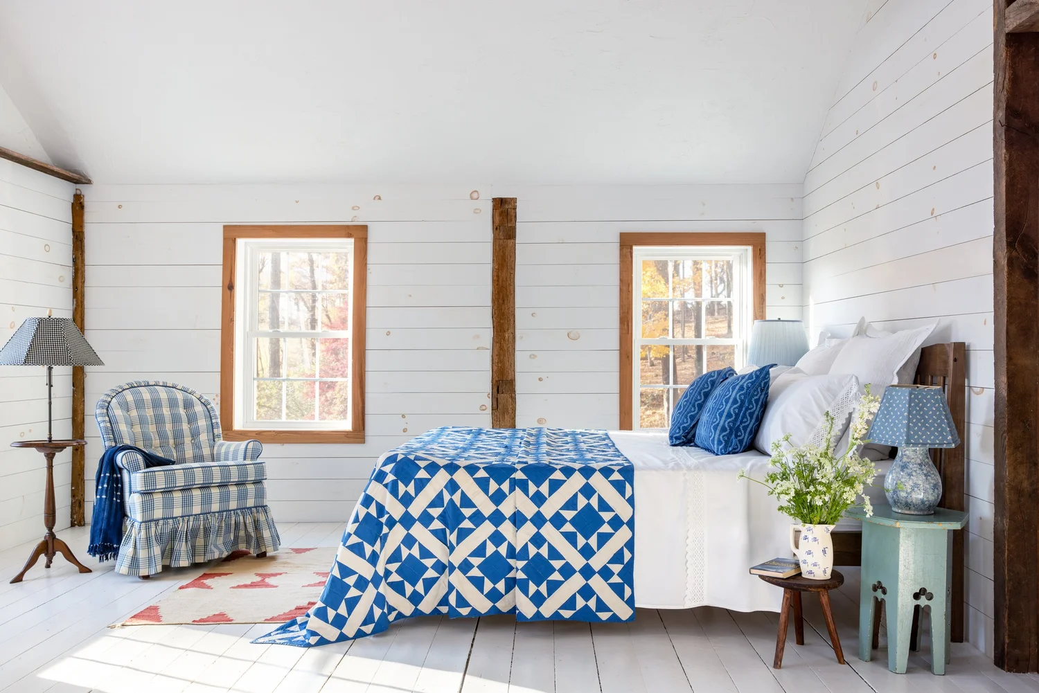 From simple decor updates to warm lighting ideas, create a space you’ll love! Ariel Okin Interior Design | Julie Leffell Photography - Love the blue an white quilt in this bedroom