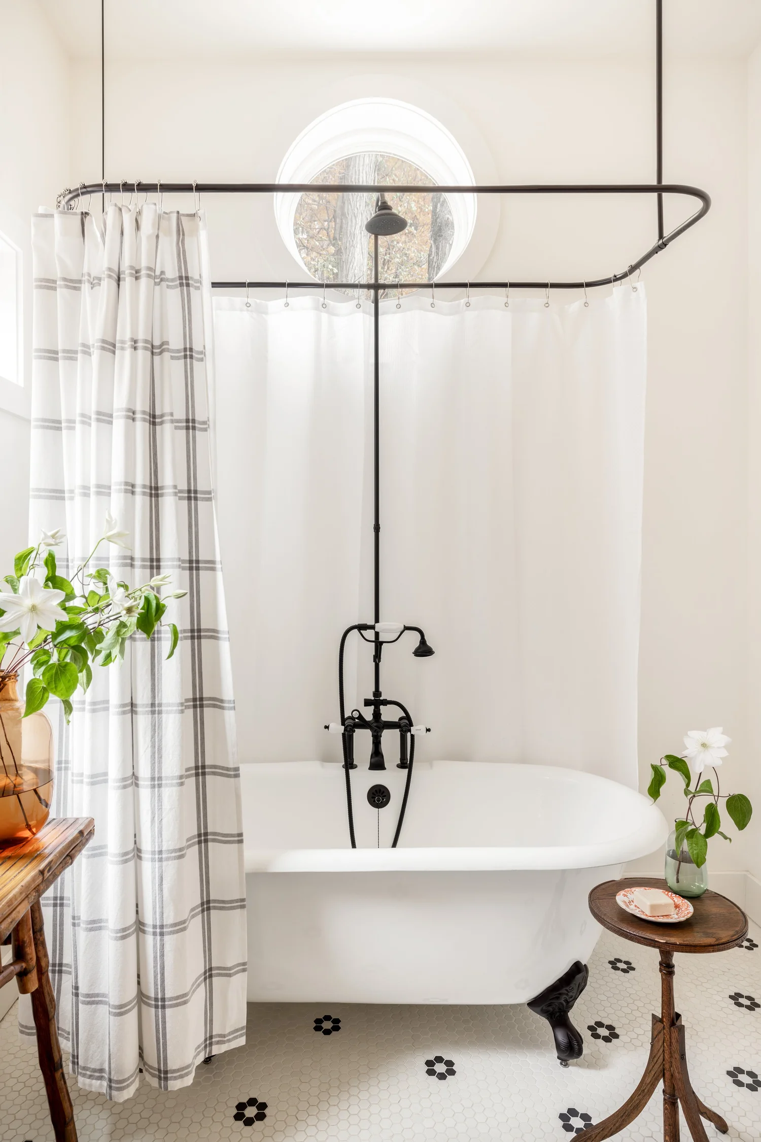 Discover ways make your home warm and inviting. From simple decor updates to warm lighting ideas, create a space you’ll love! Ariel Okin Interior Design | Julie Leffell Photography - adore the claw foot tub in this blue and white bedroom